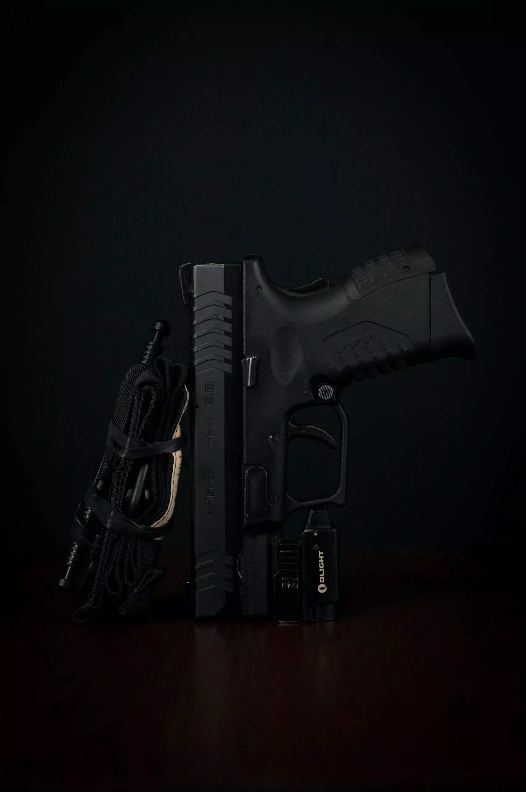 A black semi-automatic pistol.